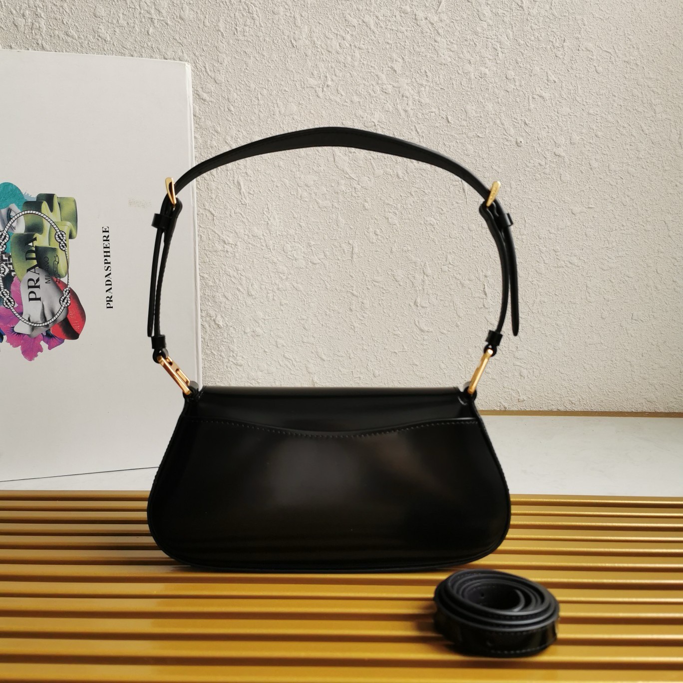 Pra*a shoulder bag in black brushed calfskin