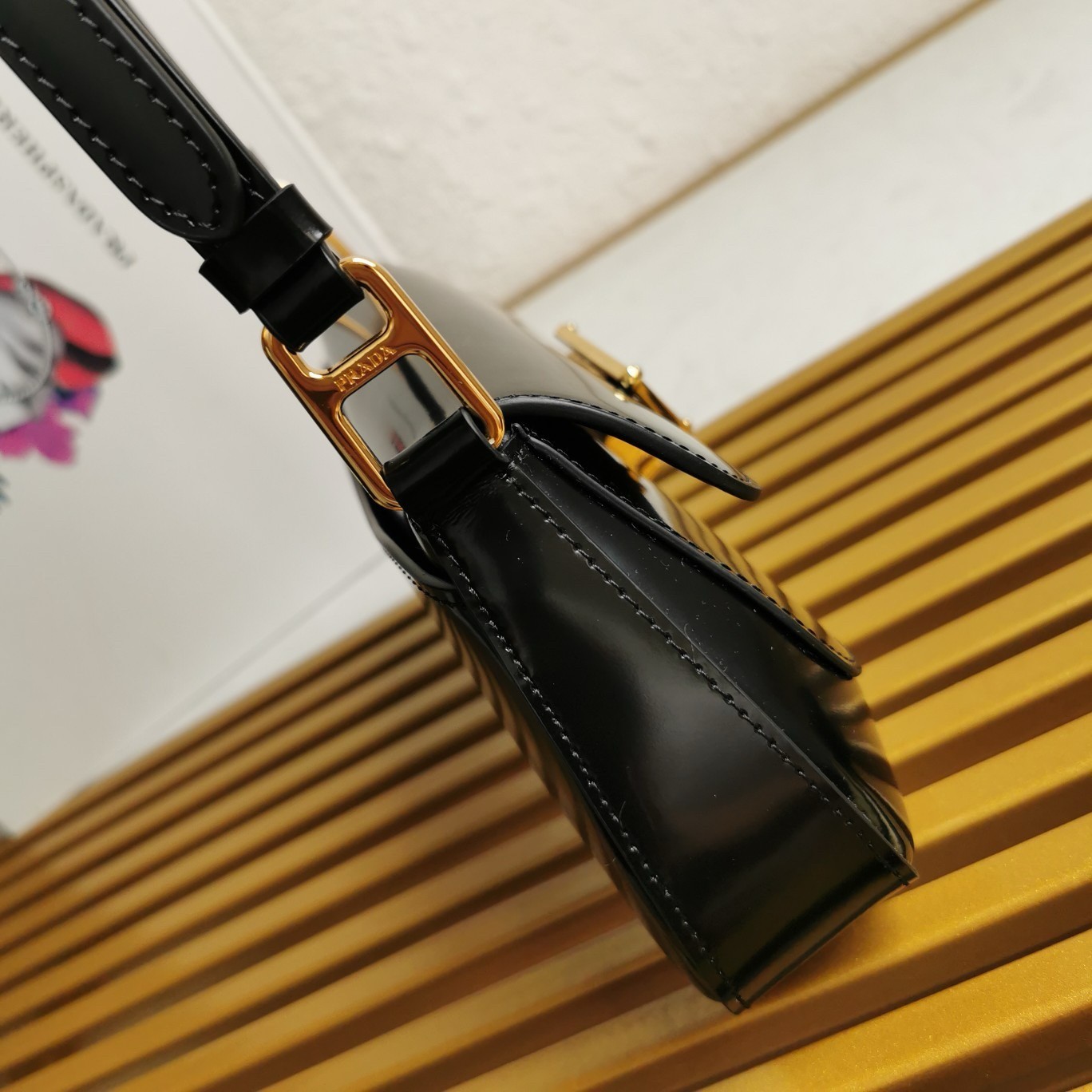 Pra*a shoulder bag in black brushed calfskin