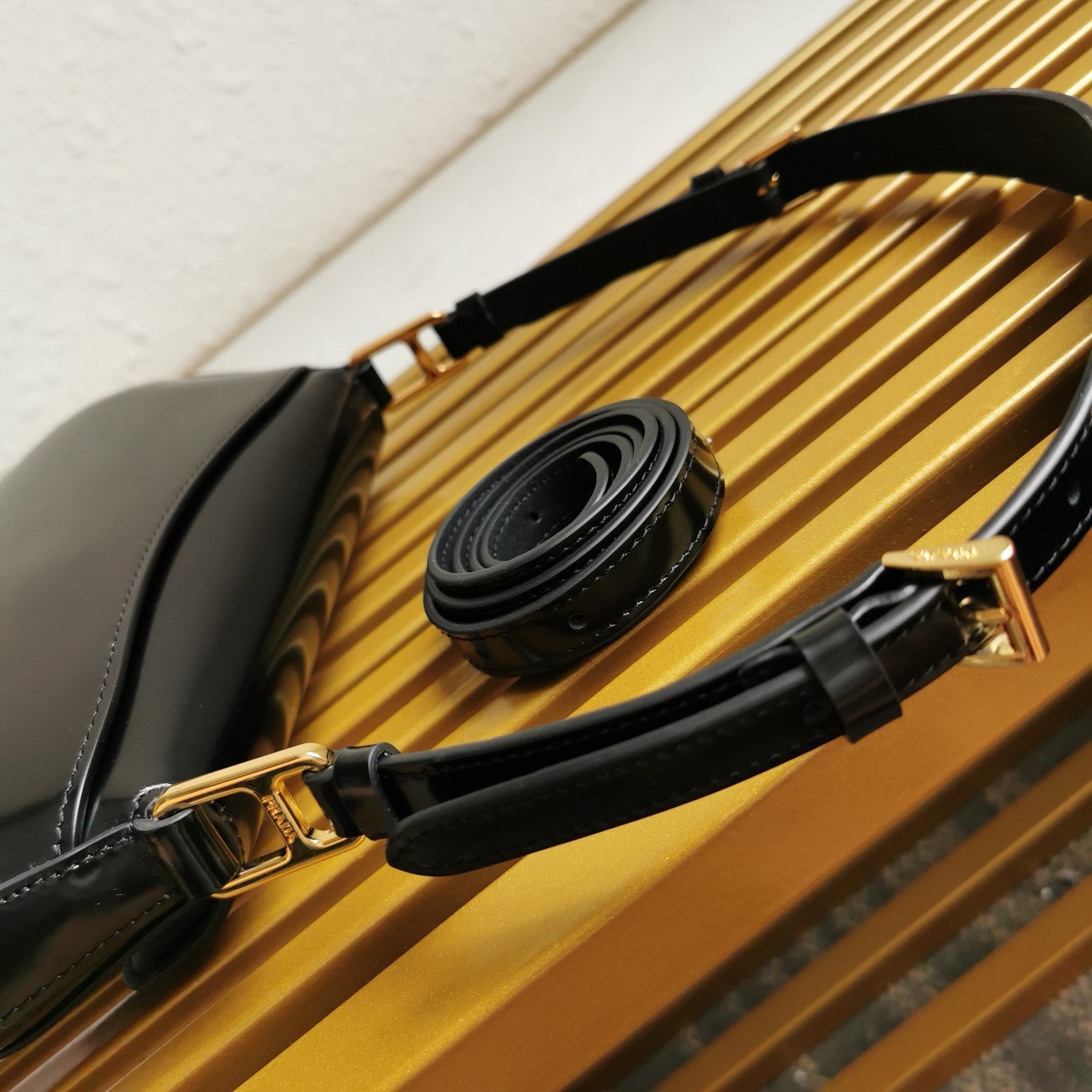 Pra*a shoulder bag in black brushed calfskin