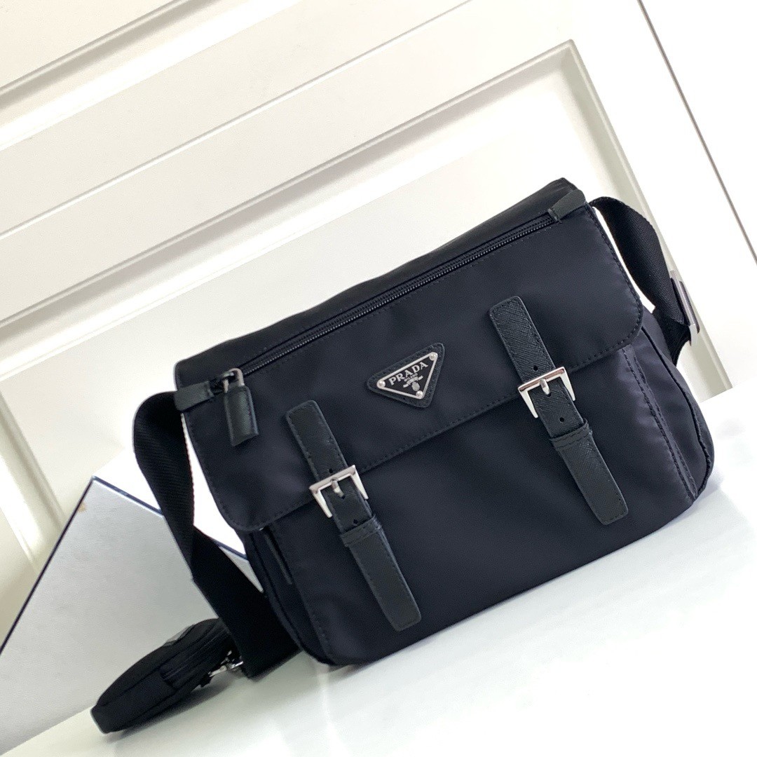 Pra*a shoulder bag with flap in black re-nylon