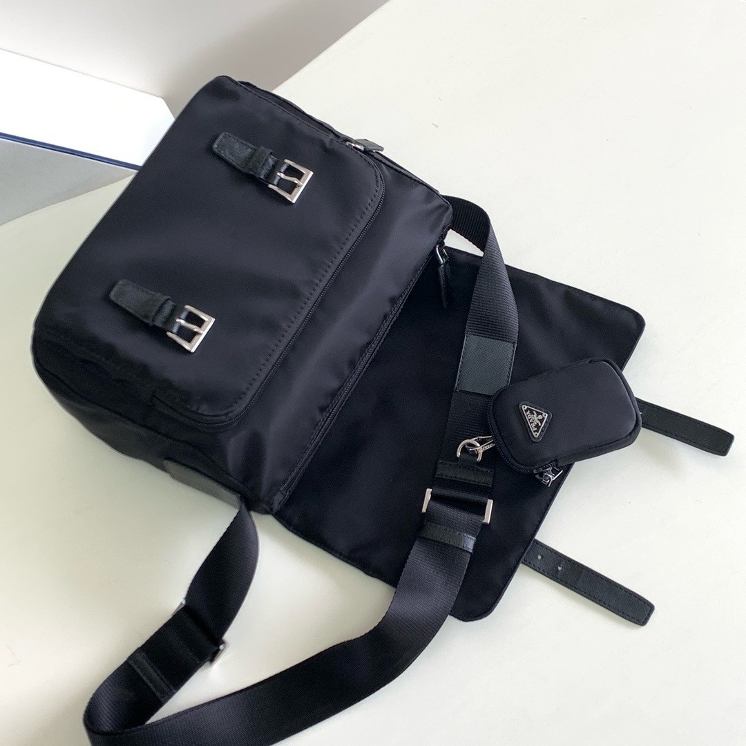 Pra*a shoulder bag with flap in black re-nylon