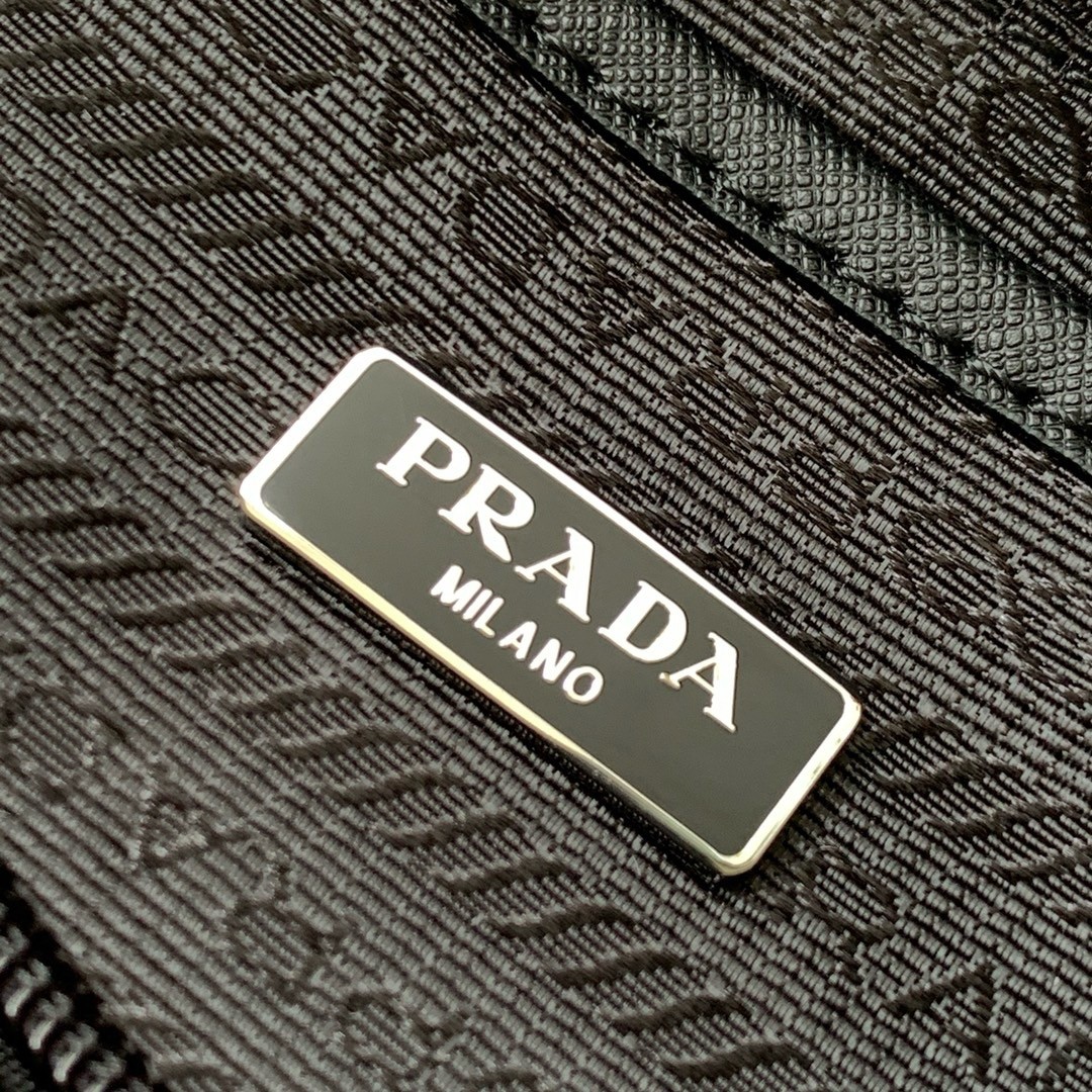 Pra*a shoulder bag with flap in black re-nylon