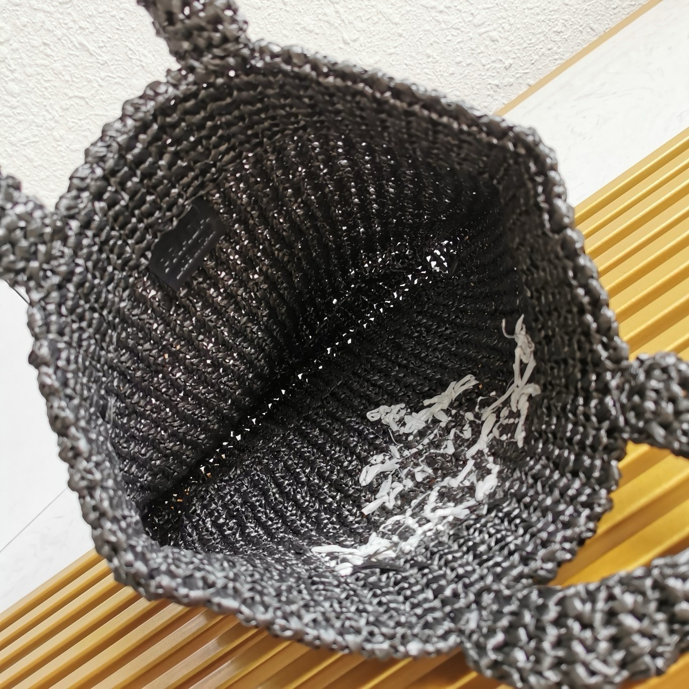 Pra*a small crochet tote bag in black raffia-effect yarn
