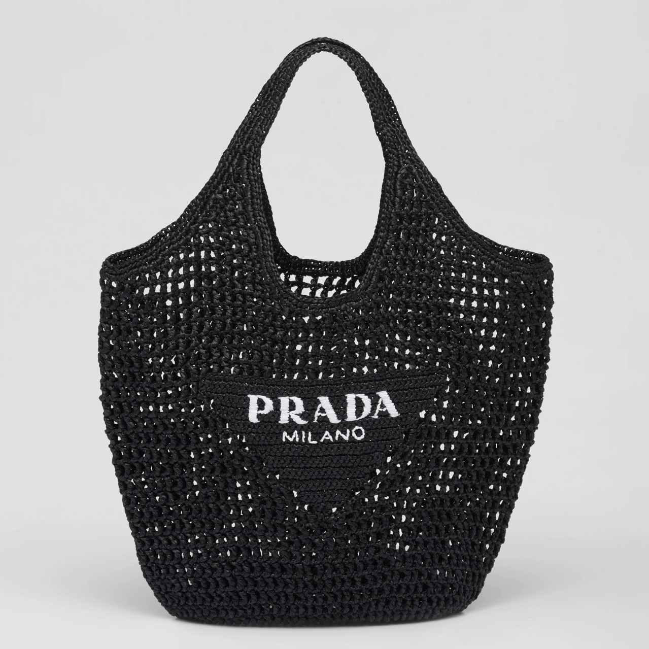 Pra*a large tote bag in black woven raffia
