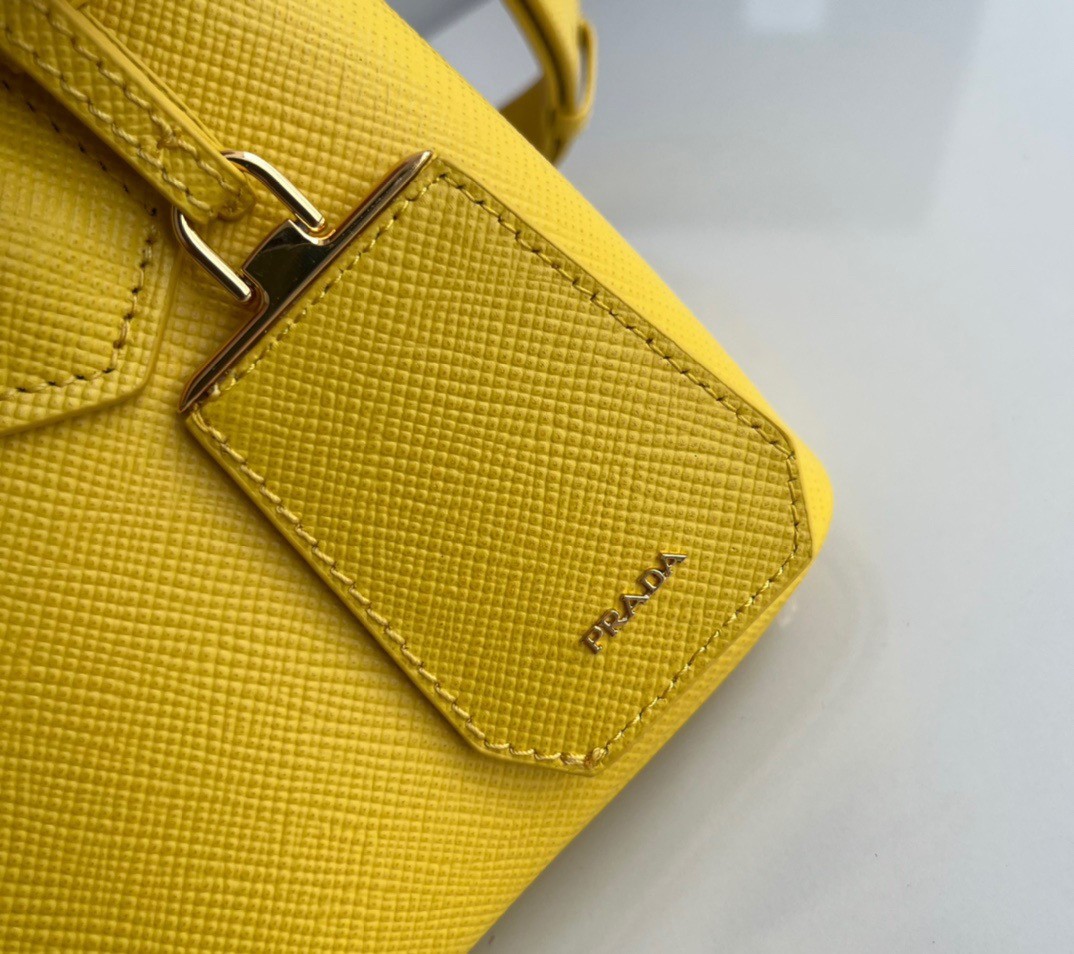 Pra*a double mini bag in yellow saffiano leather