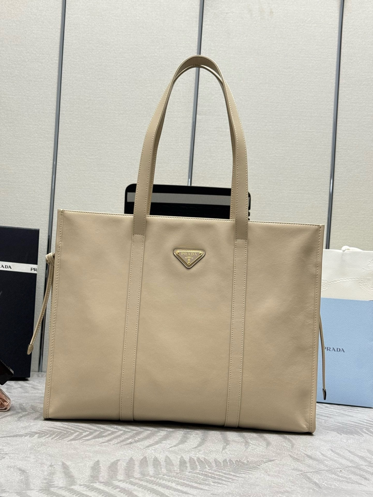 Pra*a large tote bag in beige lambskin