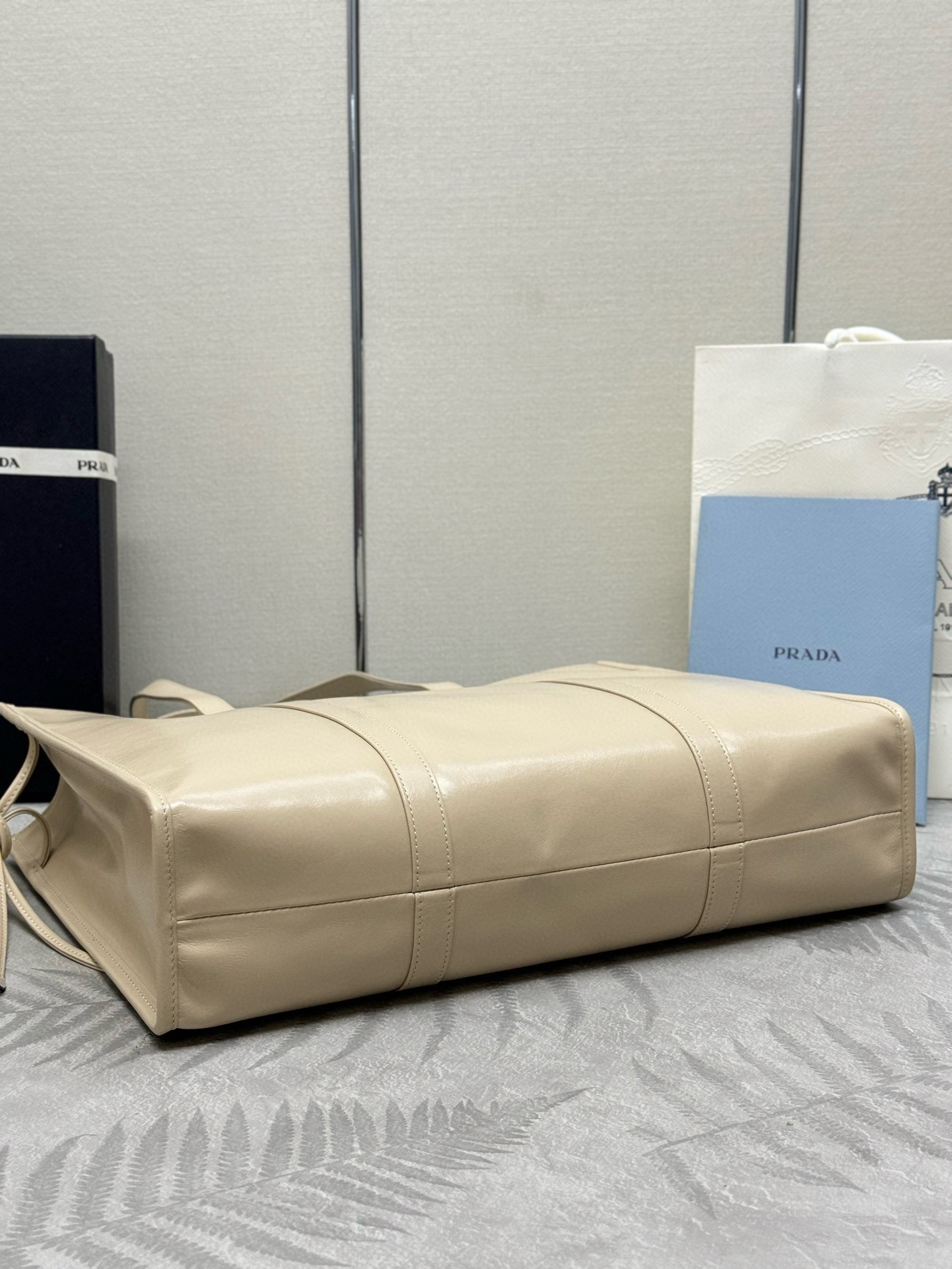 Pra*a large tote bag in beige lambskin