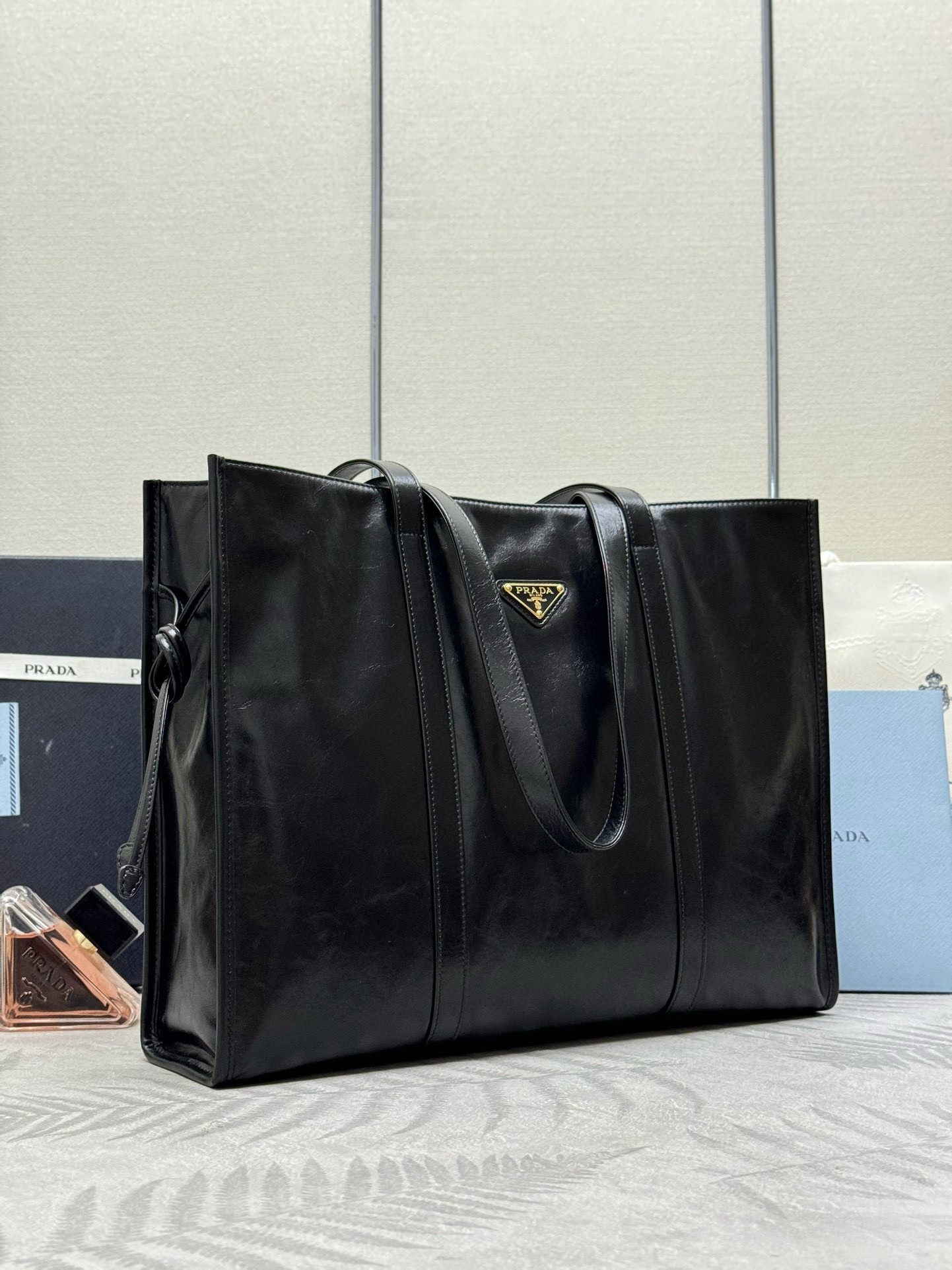 Pra*a large tote bag in black lambskin