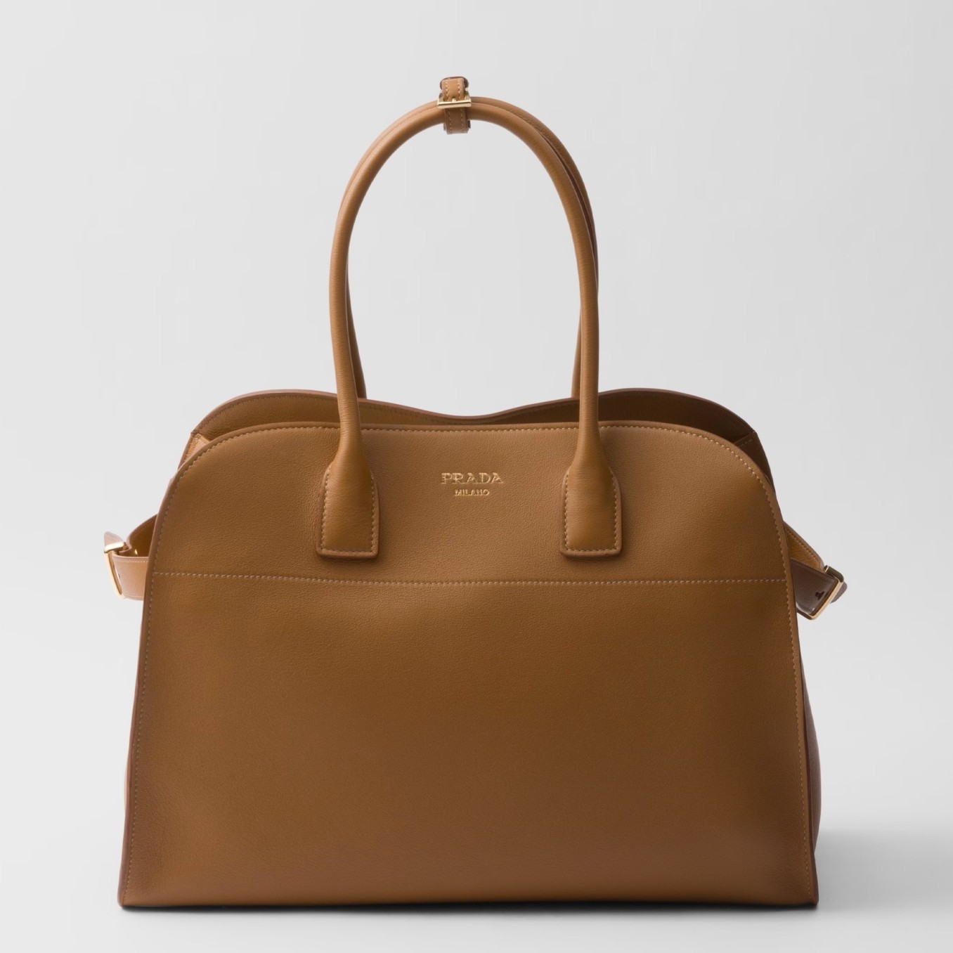 Pra*a large tote bag in brown leather with buckles