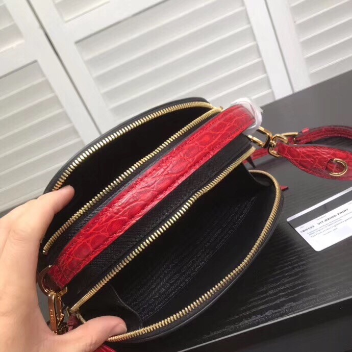 Pra*a odette black saffiano and red crocodile bag