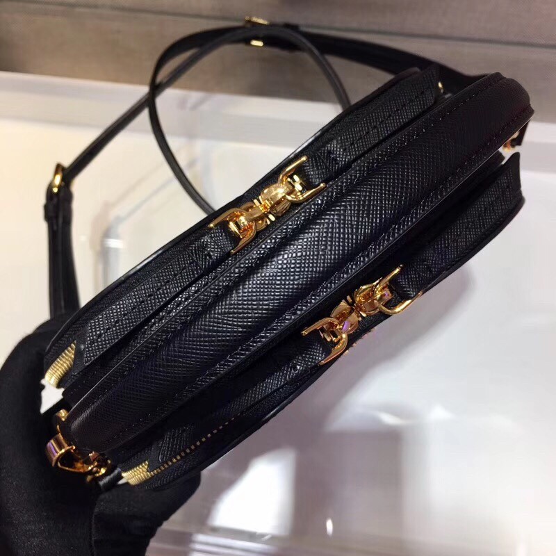 Pra*a odette heart bag in black saffiano leather
