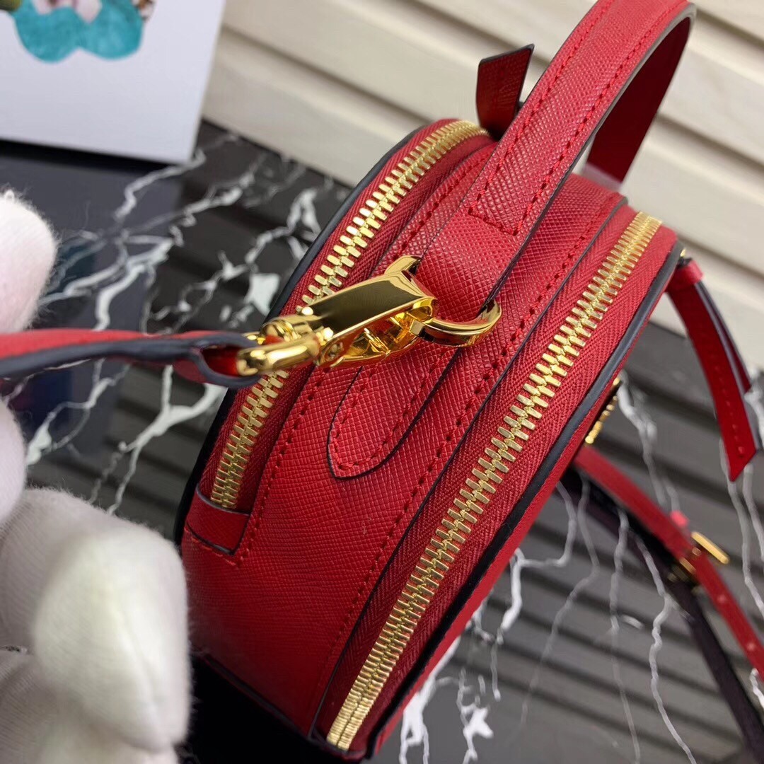 Pra*a odette heart bag in red saffiano leather