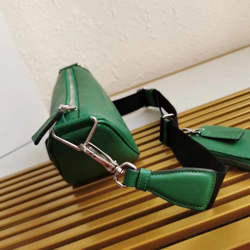 Pra*a triangle shoulder bag in green leather