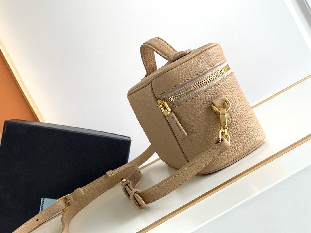 Pra*a mini vanity bag in sand beige grained leather