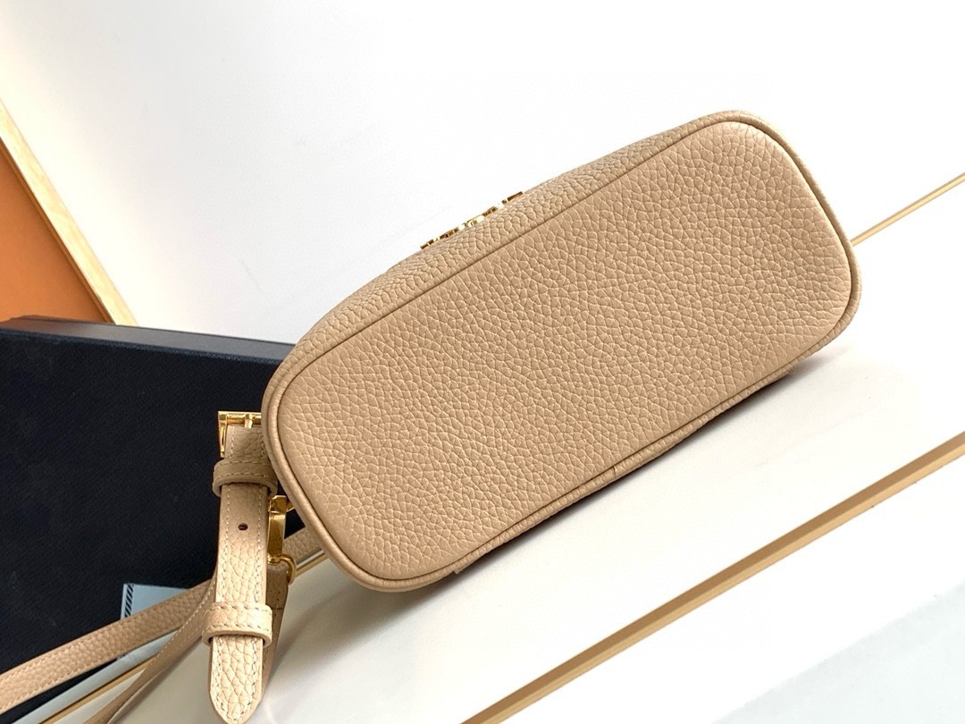 Pra*a mini vanity bag in sand beige grained leather