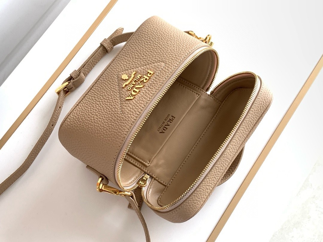 Pra*a mini vanity bag in sand beige grained leather