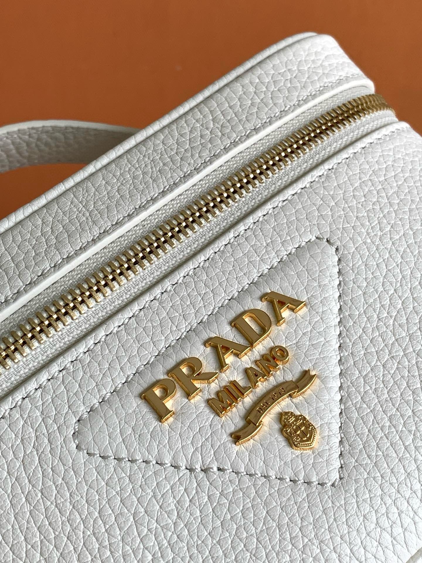 Pra*a mini vanity bag in white grained leather