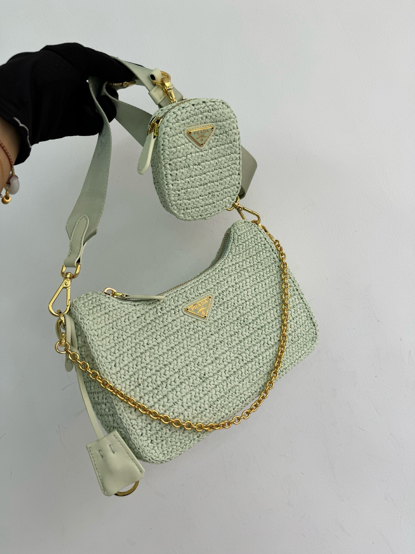 Pra*a re-edition 2005 crochet bag in aqua raffia
