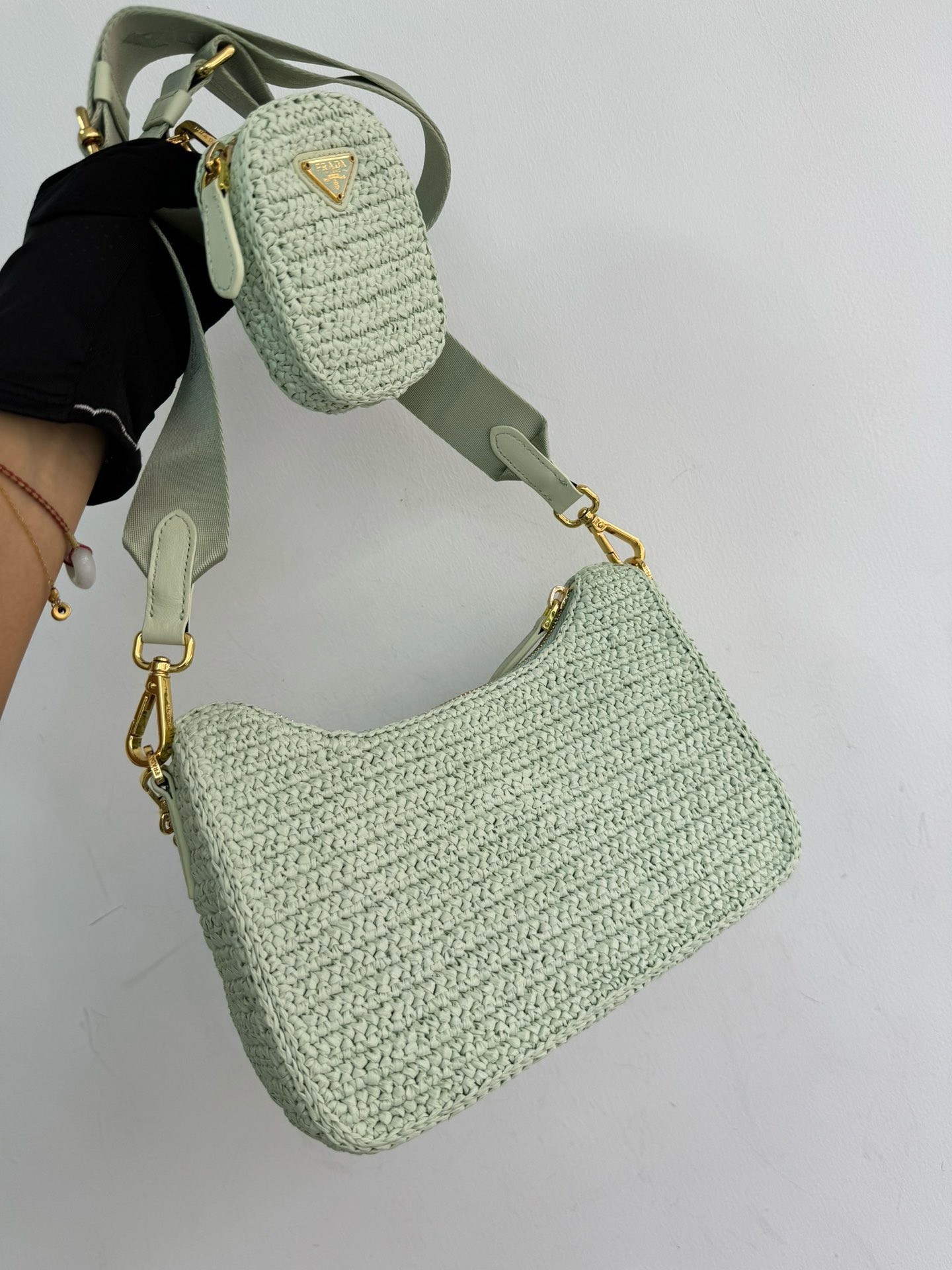 Pra*a re-edition 2005 crochet bag in aqua raffia
