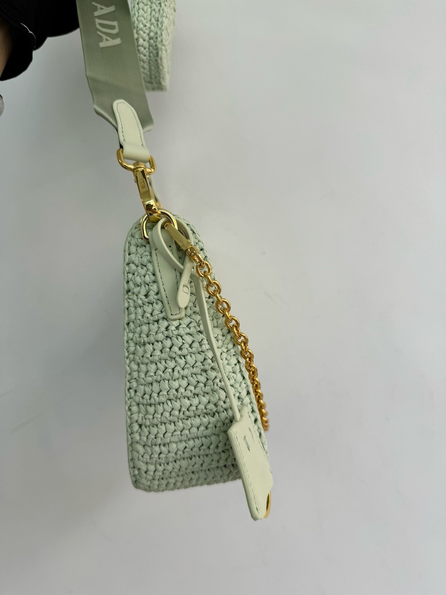 Pra*a re-edition 2005 crochet bag in aqua raffia