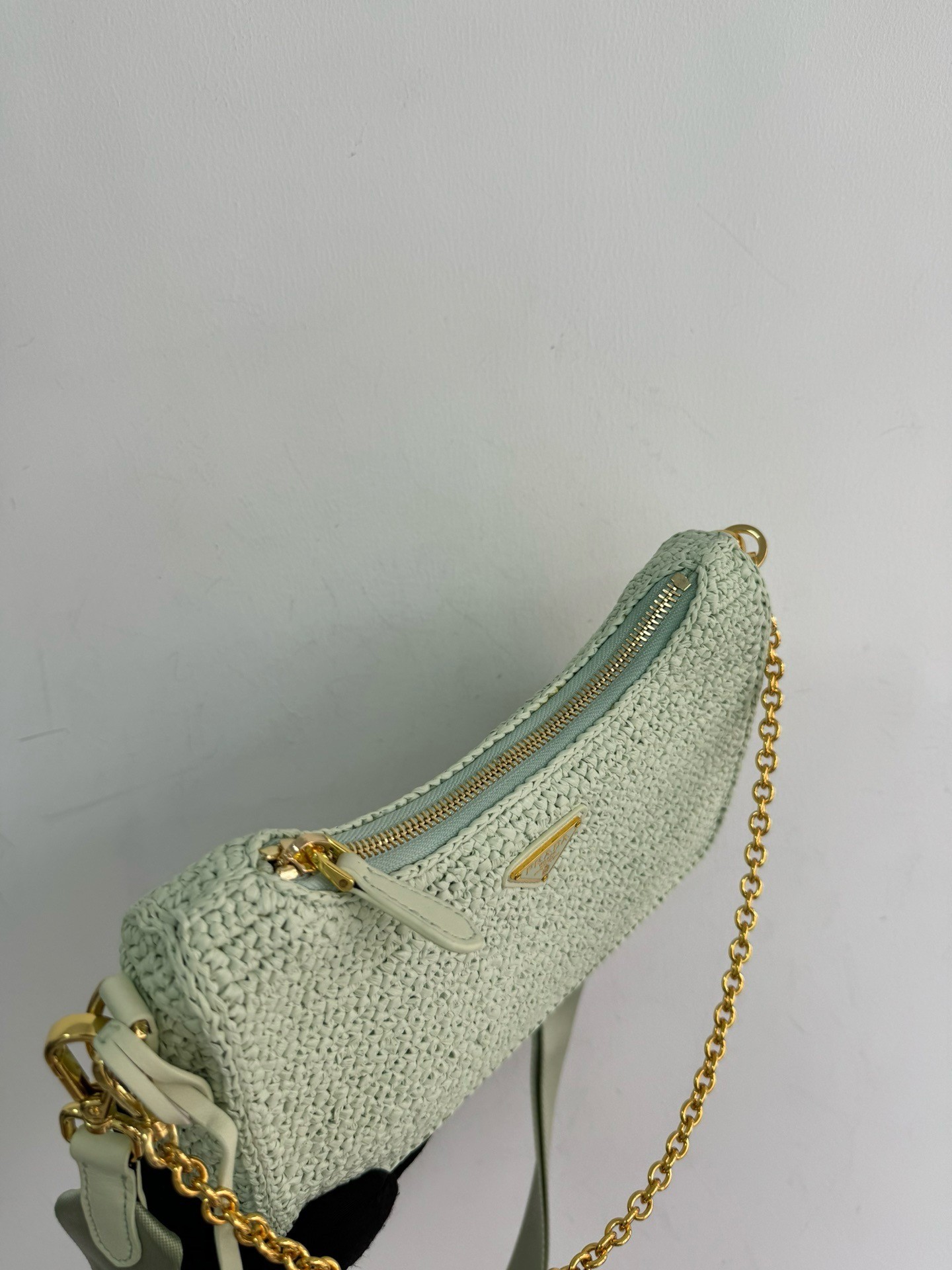 Pra*a re-edition 2005 crochet bag in aqua raffia