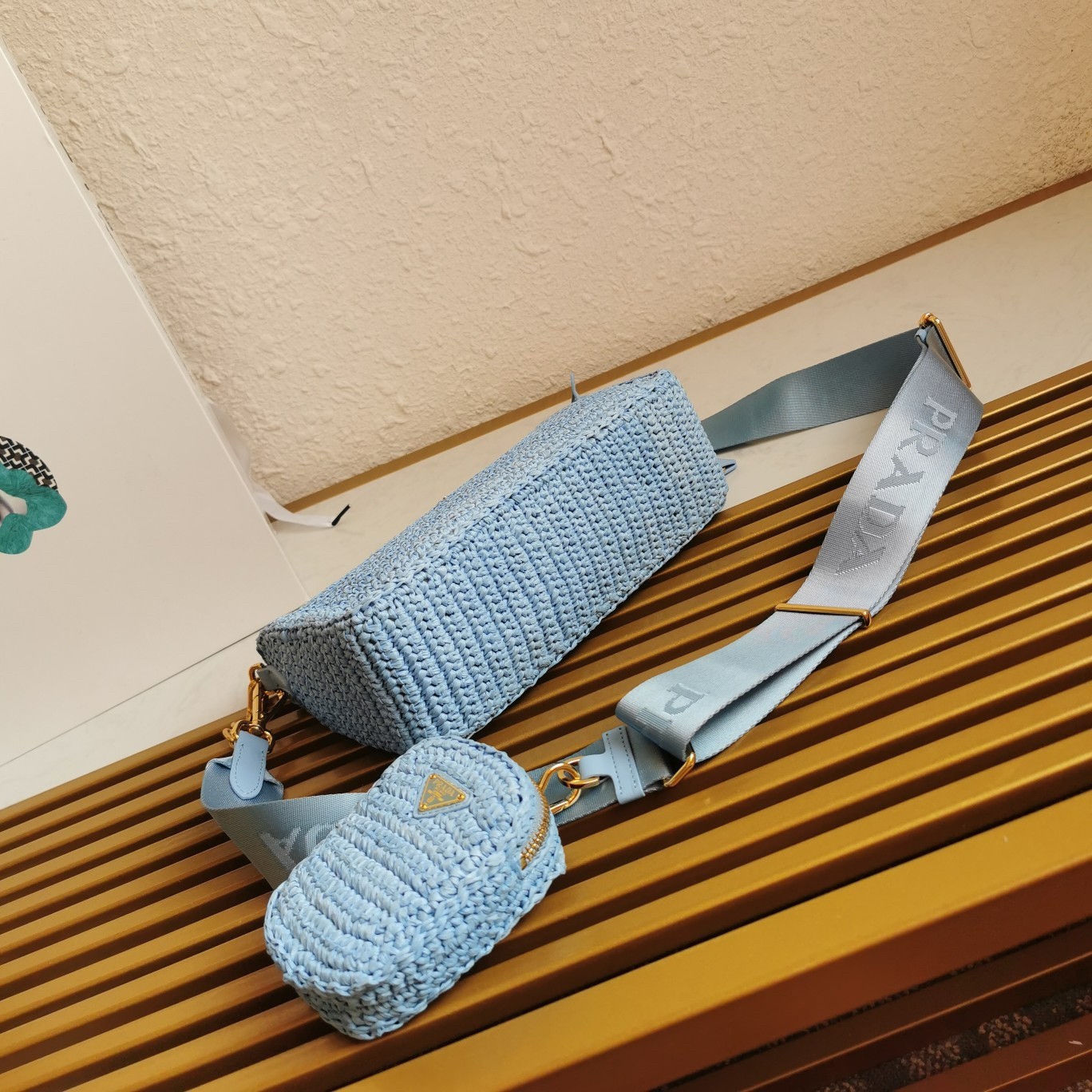 Pra*a re-edition 2005 shoulder bag in blue raffia