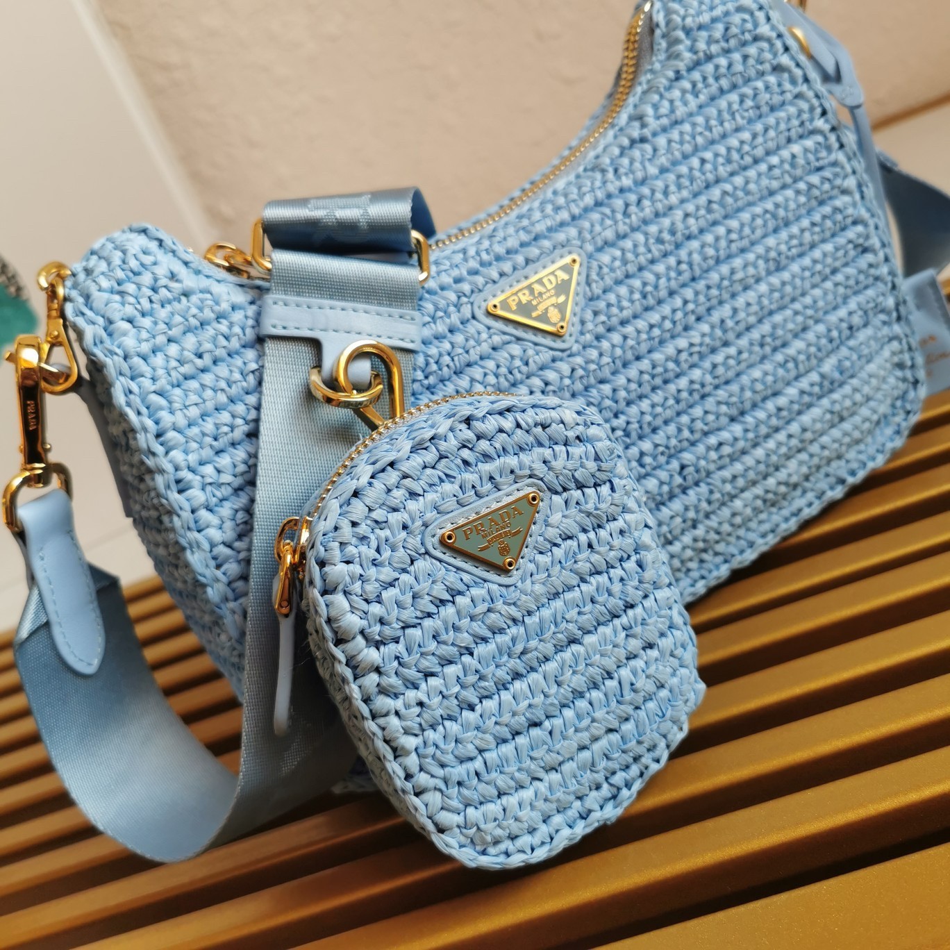 Pra*a re-edition 2005 shoulder bag in blue raffia