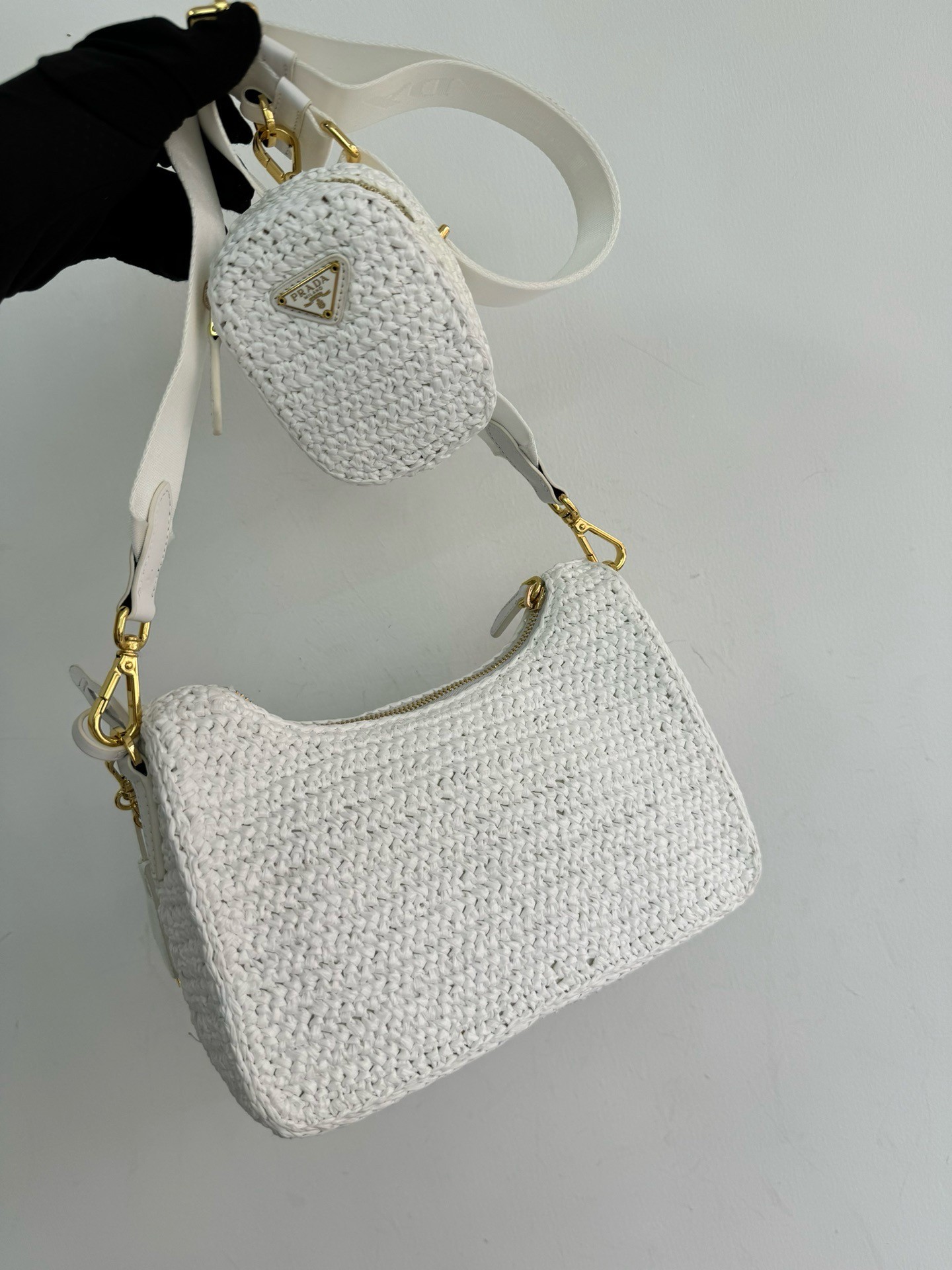 Pra*a re-edition 2005 crochet bag in white raffia