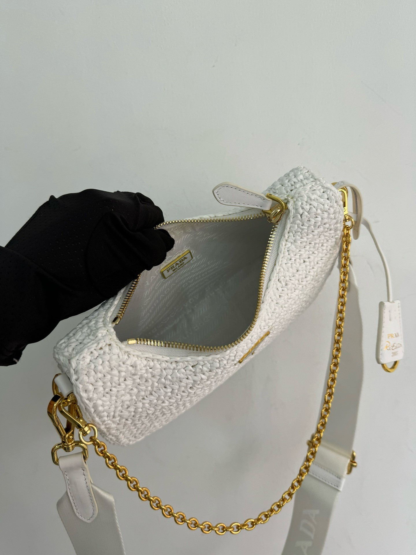 Pra*a re-edition 2005 crochet bag in white raffia