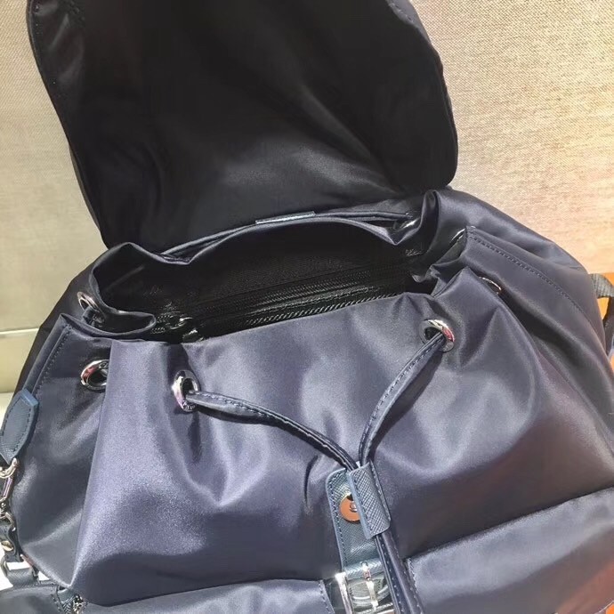 Pra*a navy blue nylon backpack with clutch