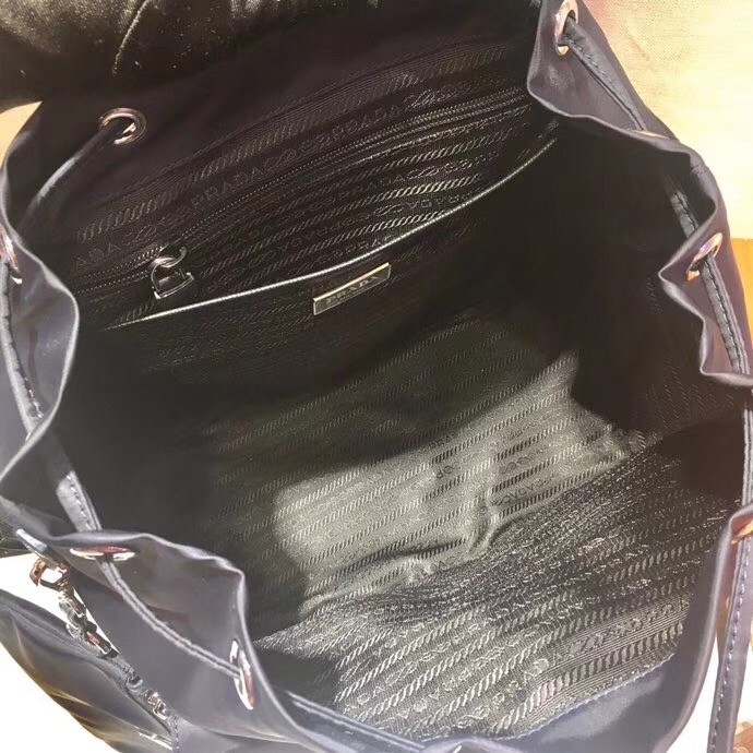 Pra*a navy blue nylon backpack with clutch