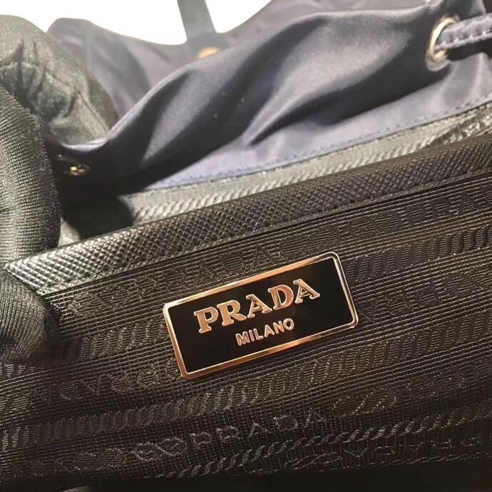 Pra*a navy blue nylon backpack with clutch