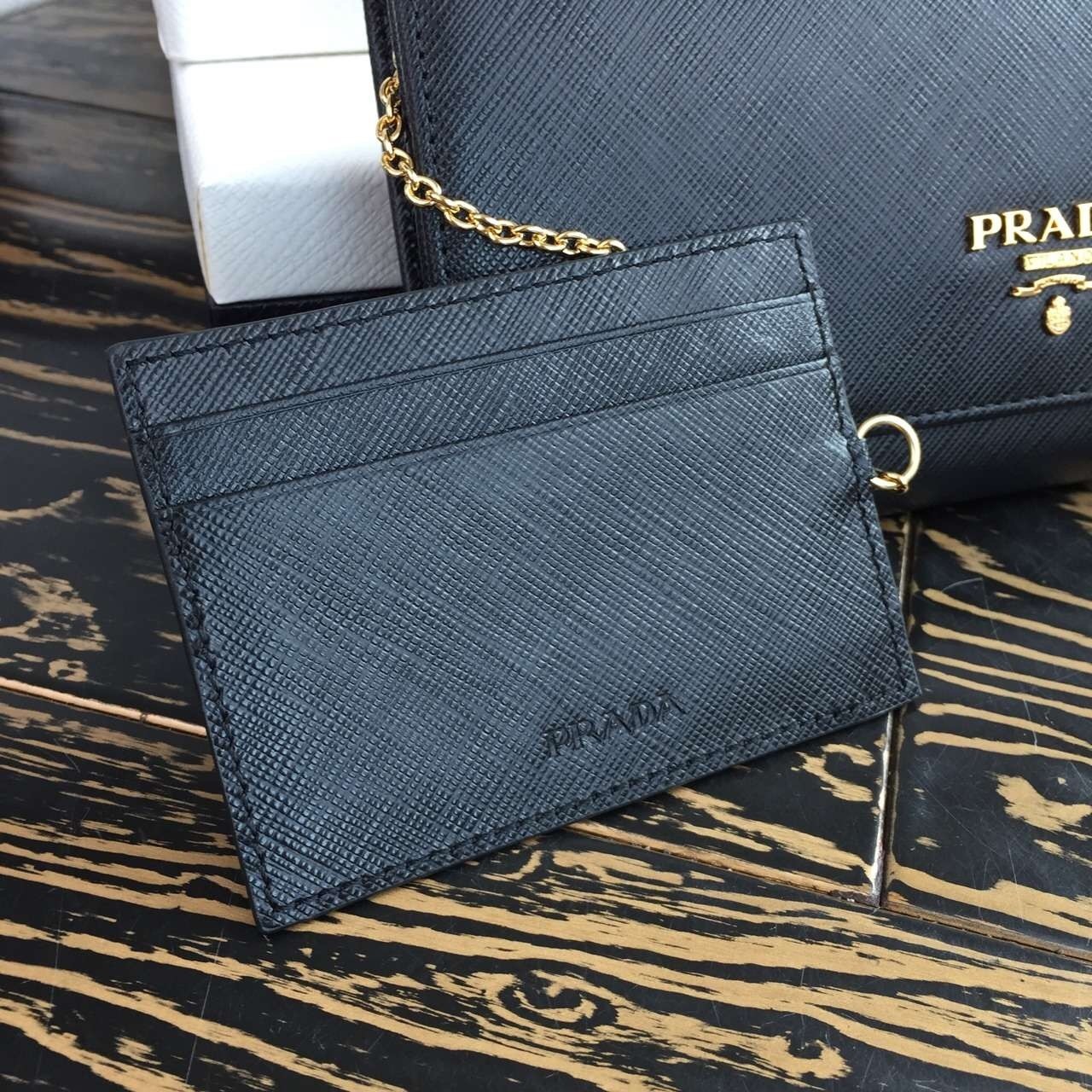 Pra*a continental wallet in black saffiano leather