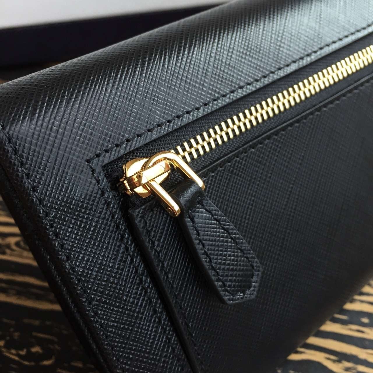 Pra*a continental wallet in black saffiano leather