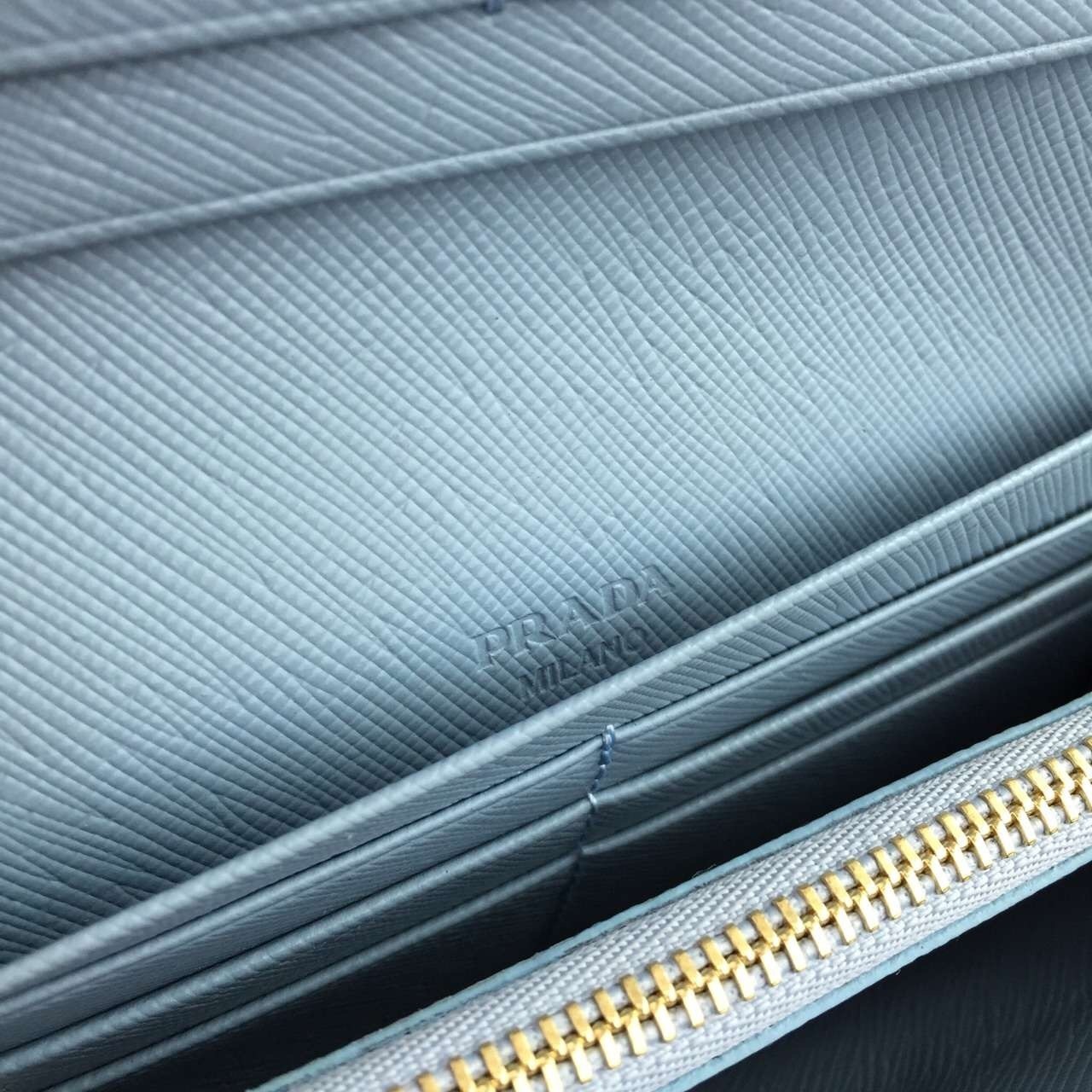 Pra*a continental wallet in light blue saffiano leather