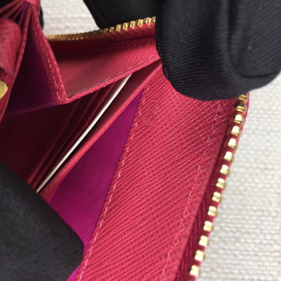 Pra*a zipped wallet in pink saffiano leather