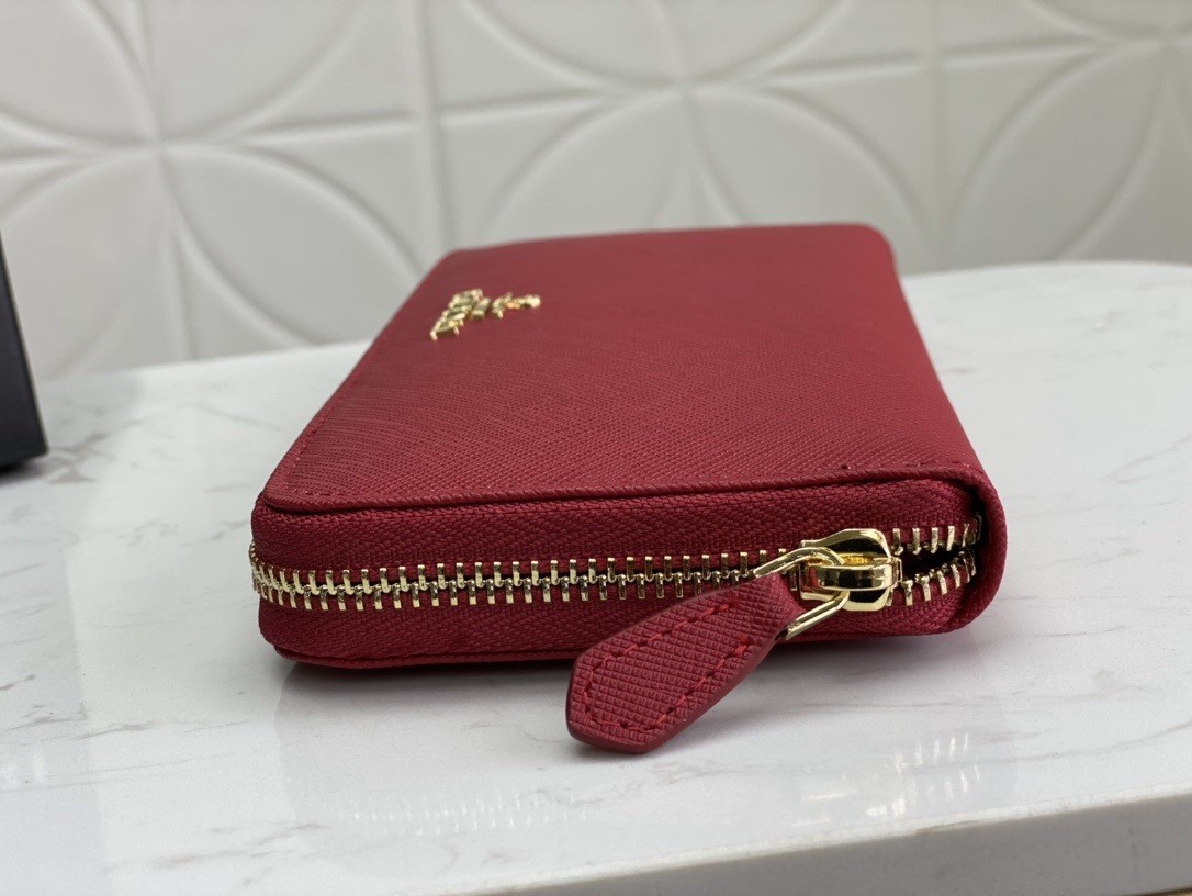 Pra*a zip around wallet in red saffiano calfskin