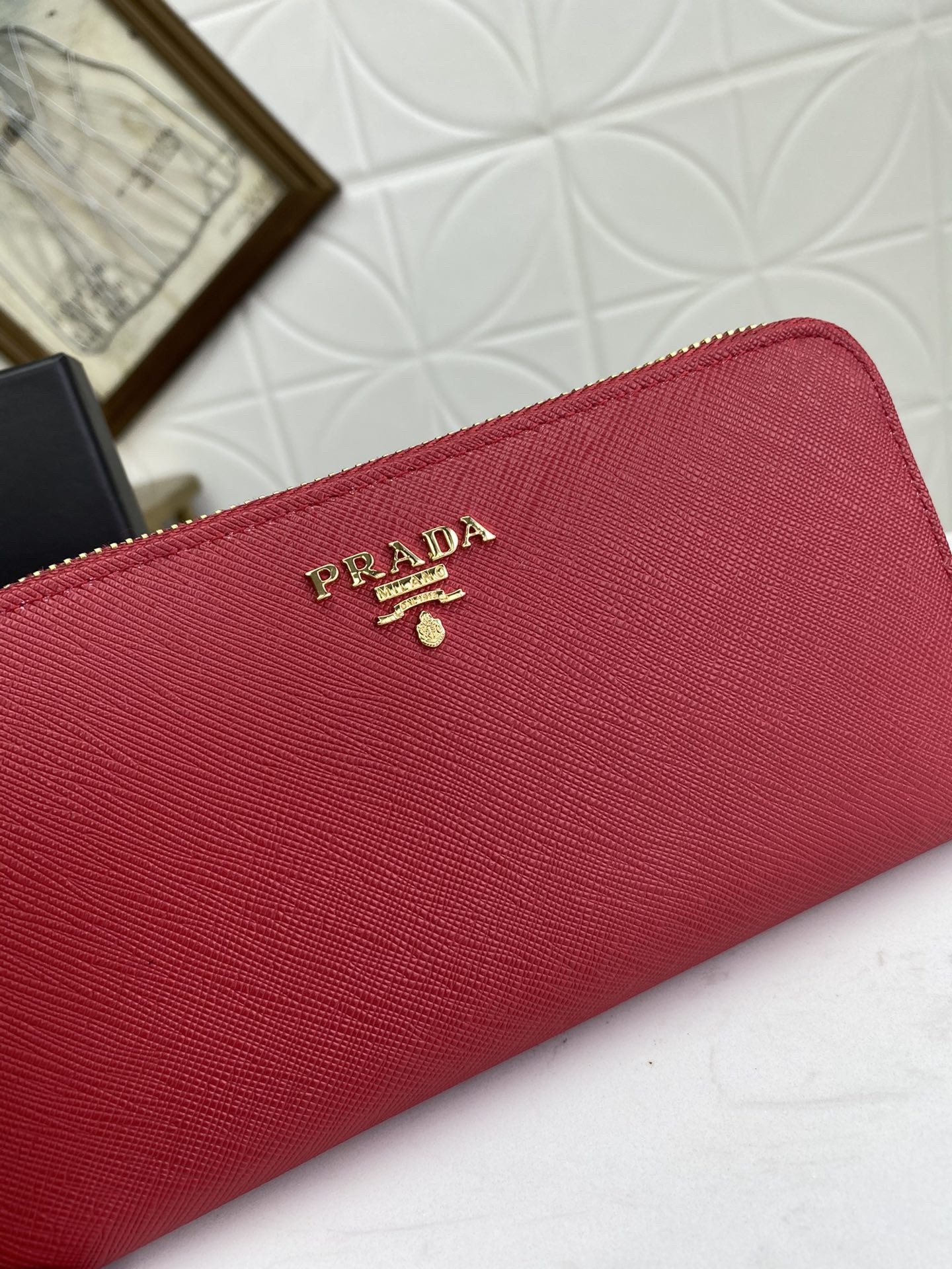 Pra*a zip around wallet in red saffiano calfskin