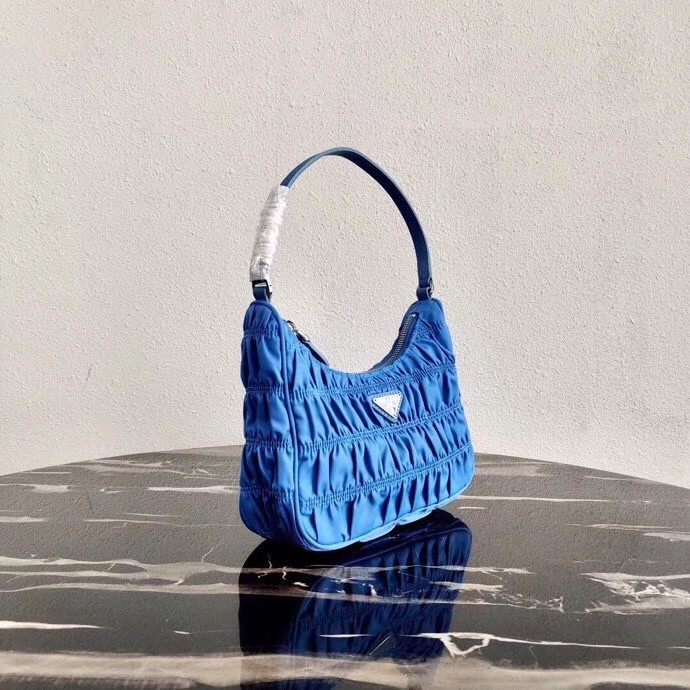 Pra*a mini hobo bag in blue nylon and leather
