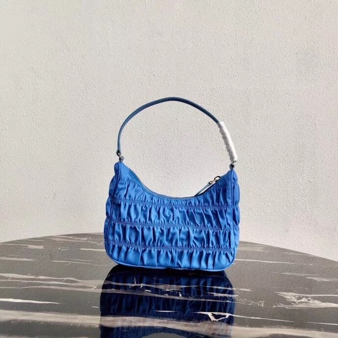 Pra*a mini hobo bag in blue nylon and leather