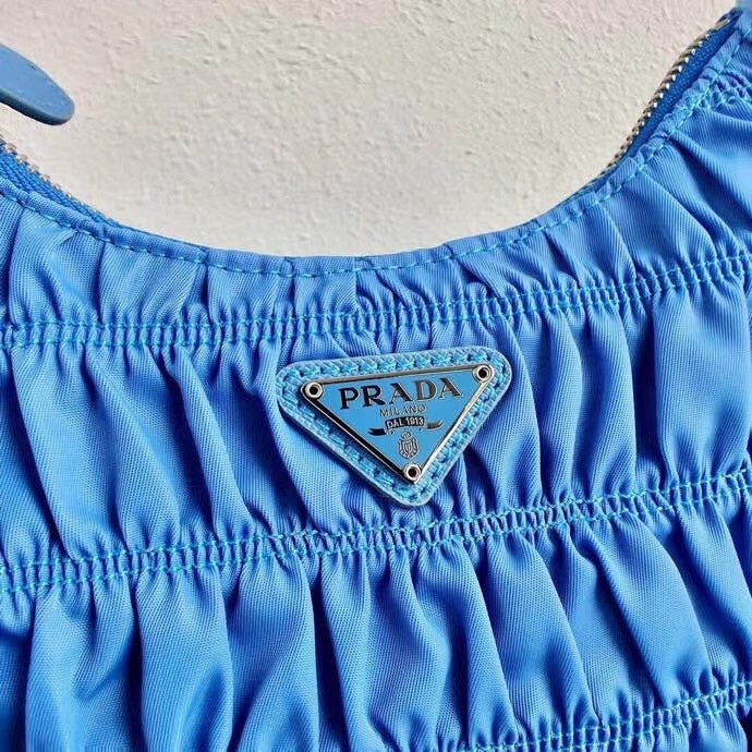 Pra*a mini hobo bag in blue nylon and leather