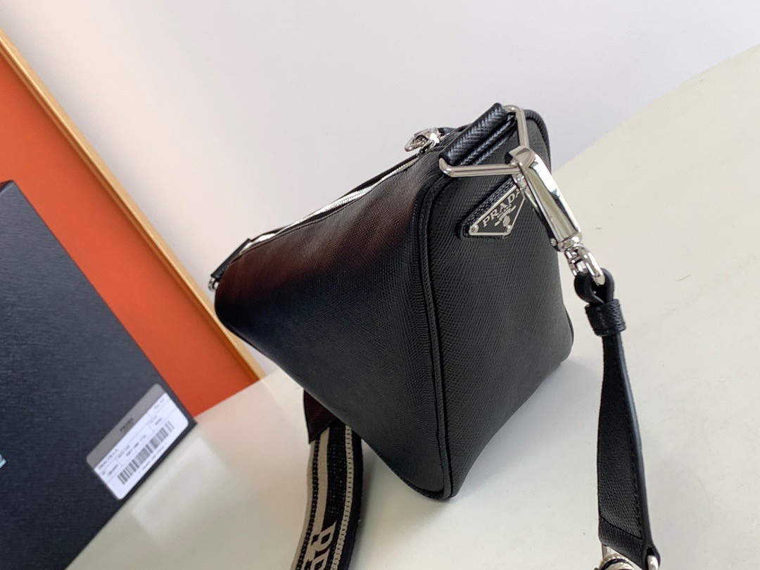 Pra*a triangle shoulder bag in black saffiano calfskin