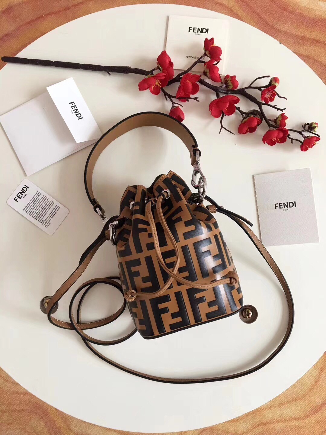F**di ff mon tresor mini bucket bag in brown calfskin