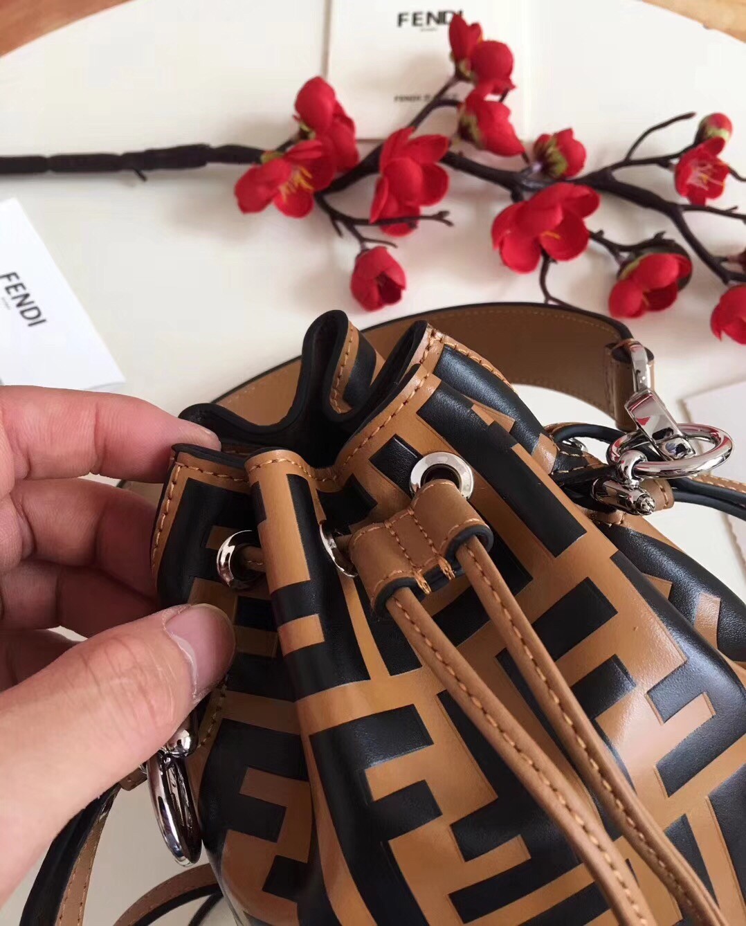 F**di ff mon tresor mini bucket bag in brown calfskin