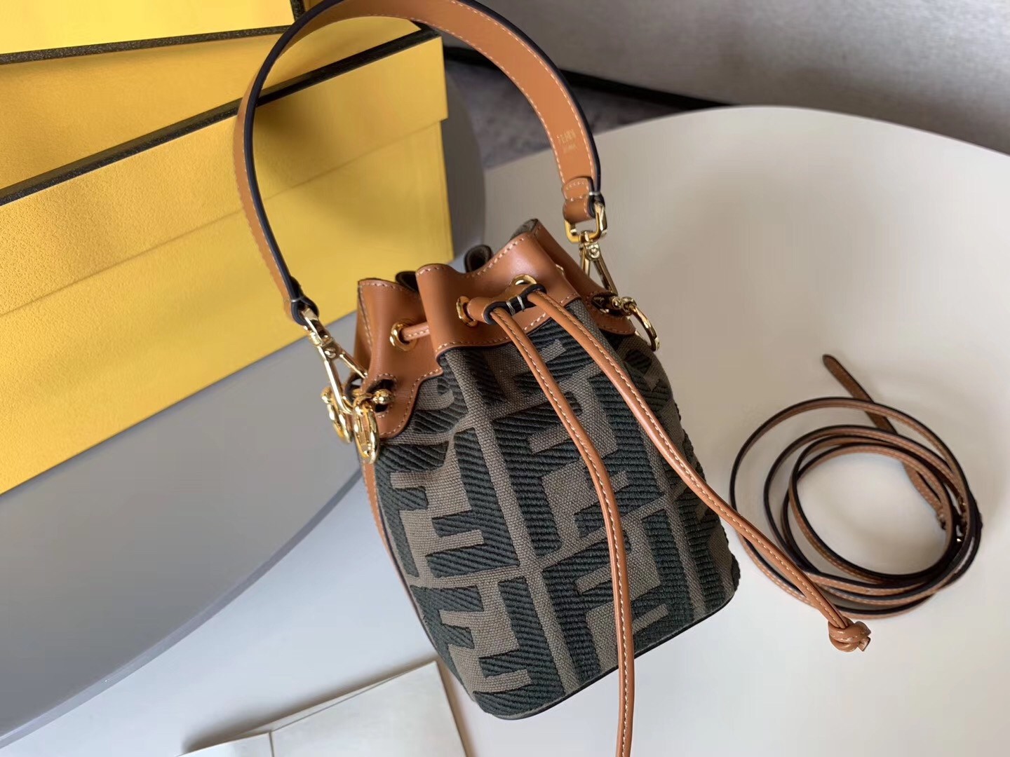 F**di mon tresor mini bucket bag in green denim