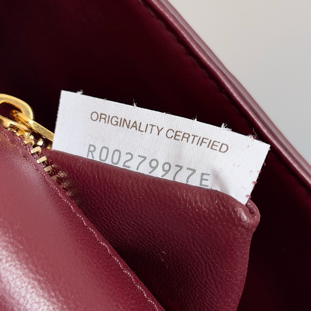 bo*te*ga Ve*ne*ta mini andiamo cross-body bag in barolo intrecciato lambskin