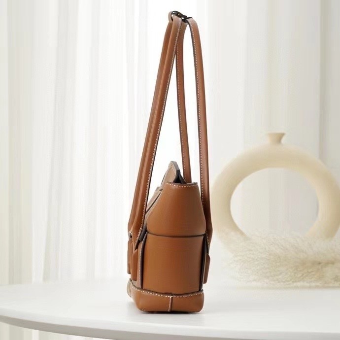 bo*te*ga Ve*ne*ta arco small bag in caramel intrecciato calfskin