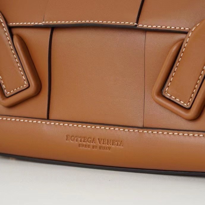 bo*te*ga Ve*ne*ta arco small bag in caramel intrecciato calfskin