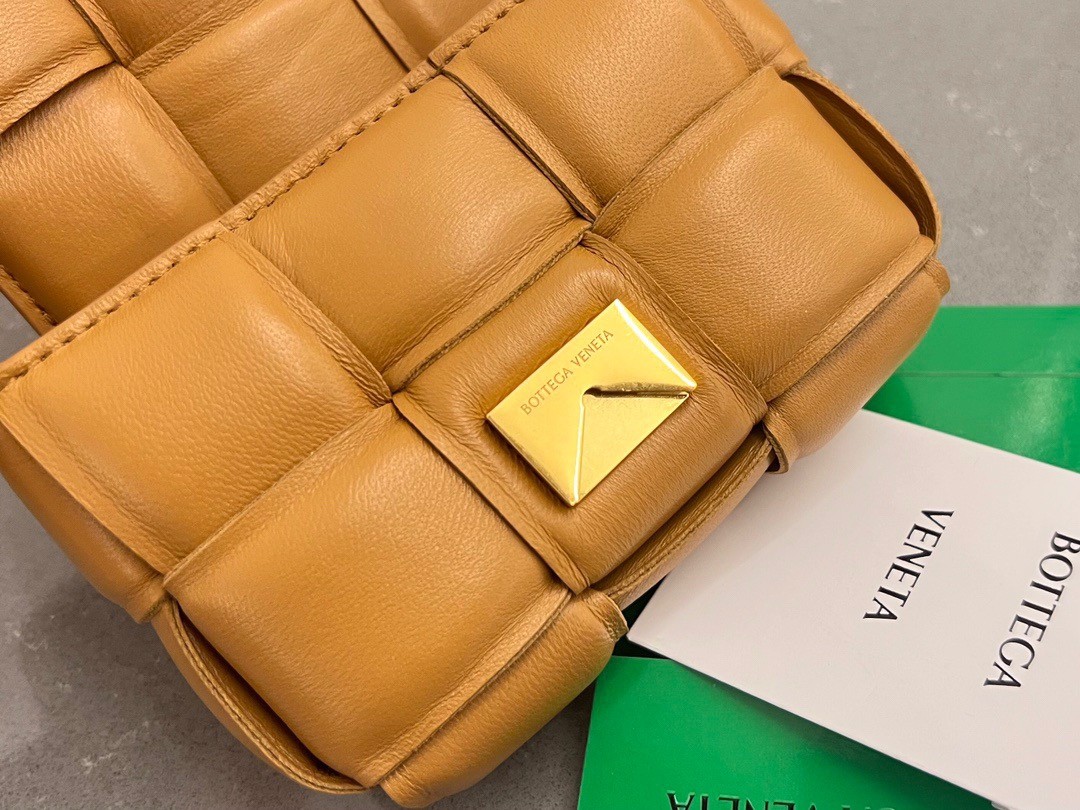 bo*te*ga Ve*ne*ta candy padded cassette bag in camel lambskin