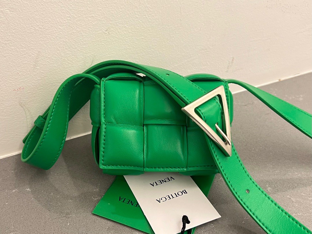 bo*te*ga Ve*ne*ta candy padded cassette bag in parakeet lambskin
